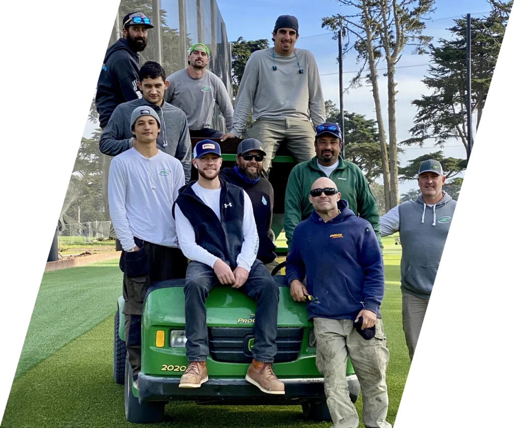 Team on golf cart at driving range